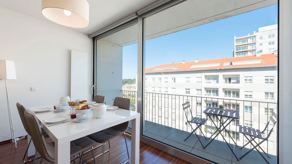 Casas Brancas w/ Balcony & Parking by LovelyStay
