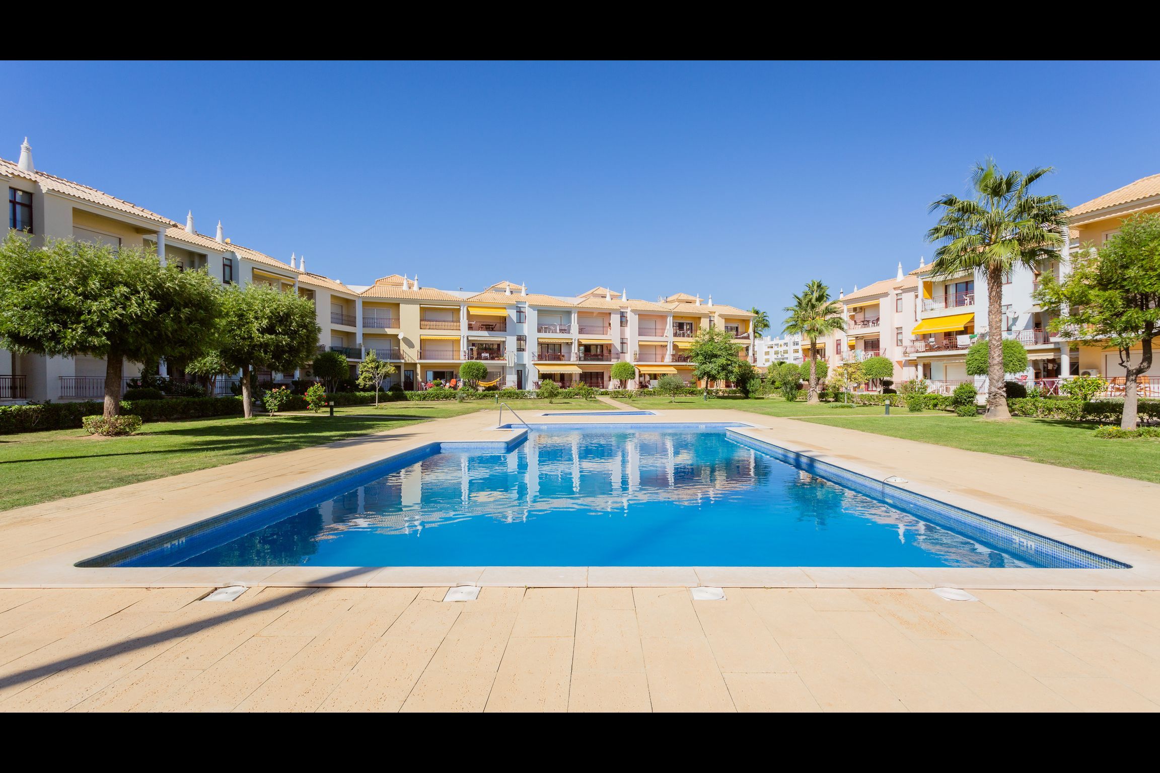 Serene Apartment W/ Balcony and Pool by LovelyStay
